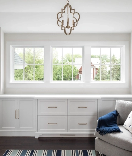 a closet with three nice windows